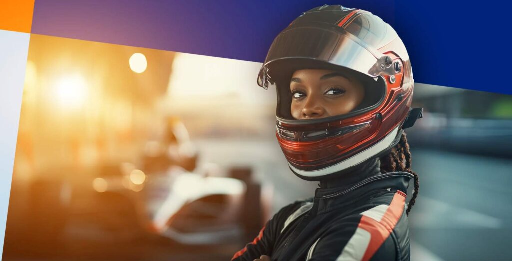 Mulher piloto representando a presença crescente das mulheres no automobilismo, com capacete e macacão de corrida, encarando a câmera com confiança em um autódromo ao entardecer.
